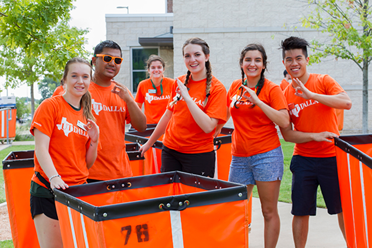 Students helping with the move-in process